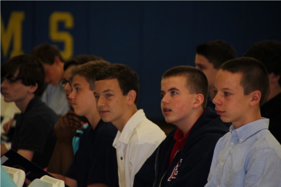 Incoming members of the Class of 2018 listen to the preliminary speeches given at this years Orientation.