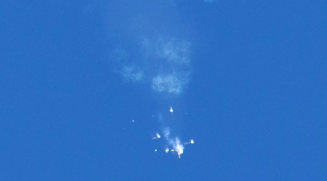 One of the four strap-on boosters collided with and damaged the center booster.