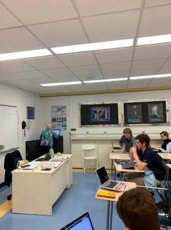 Mrs. Crum teaching the junior and senior physics class.