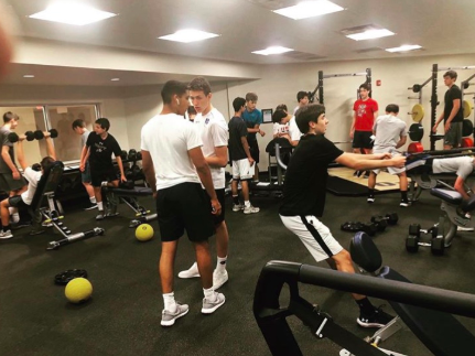 Members of the OP student body working hard in the fitness center to prepare for upcoming athletic seasons, or to get in better shape.	
