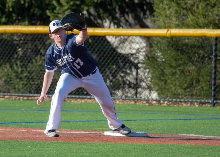 Pictured+above%2C+Jack+Lawlo+Lawlor+shows+off+his+athleticism+at+first+base+while+receiving+a+throw+from+home+plate.