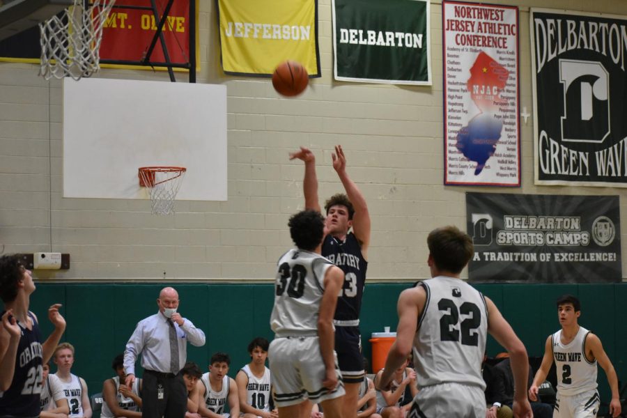 Mike Pirone shown knocking down a 3 in last years win against Delbarton 