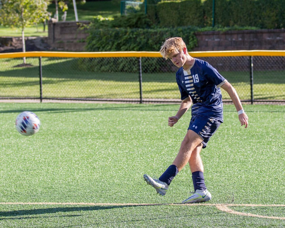 (Senior Jack Maenpae warming up against Governing Livingston last season)